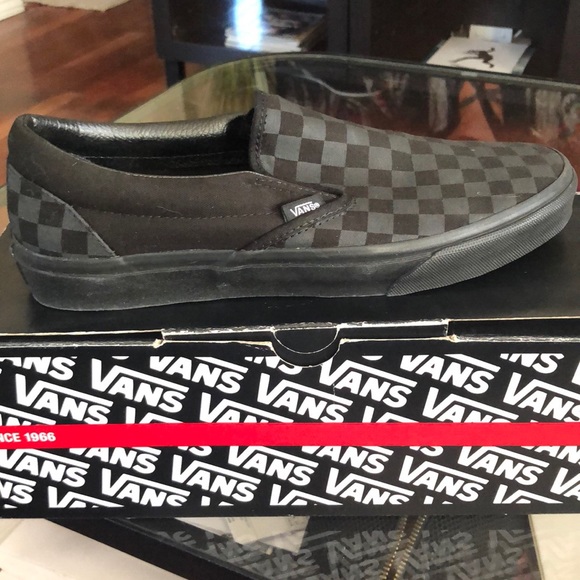 vans classic slip on black monochromatic shoes